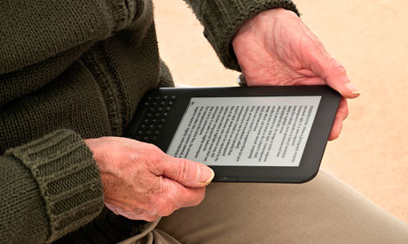 An ebook being used by an elderly person