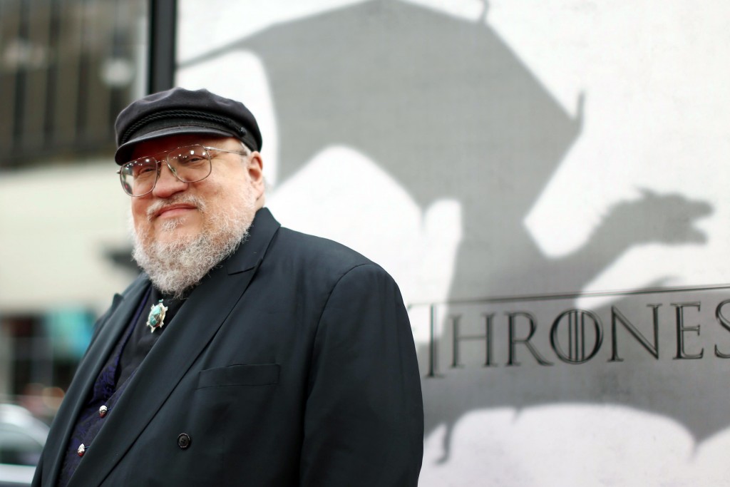 FILE - In this March 18, 2013 file photo, author George R.R. Martin arrives at the premiere for the third season of the HBO television series "Game of Thrones" at the TCL Chinese Theatre in Los Angeles. "The World of Ice & Fire: The Untold History of Westeros and the Game of Thrones," a companion volume to Martin's "Ice and Fire" series, will be released Tuesday, Oct. 28, 2014. (Photo by Matt Sayles /Invision/AP, File)